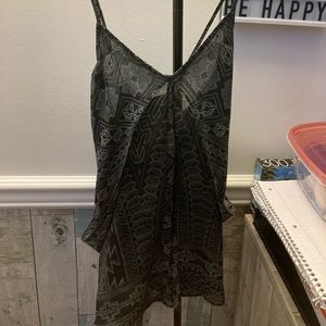 Black top with white patterns.